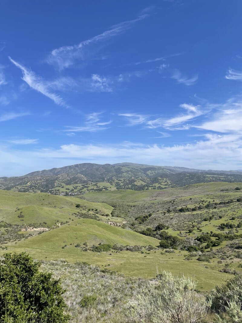 A dusty, winding trail through the hills of Fort Ord